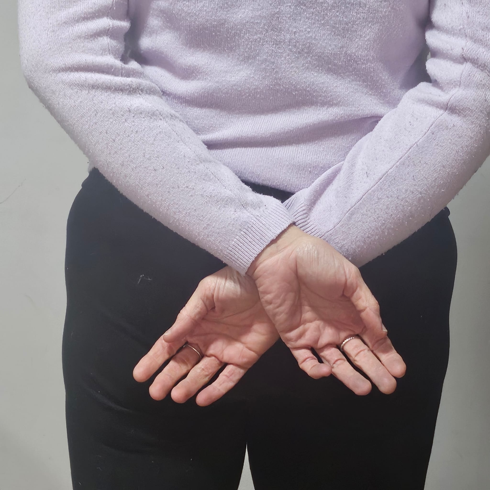hands behind back, invisiable shibari rope in gote position