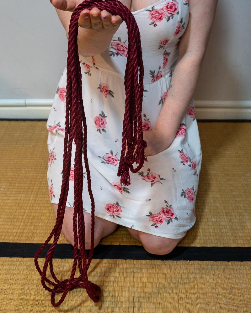 Shibari rope coiled, ready to hank. Tutorial