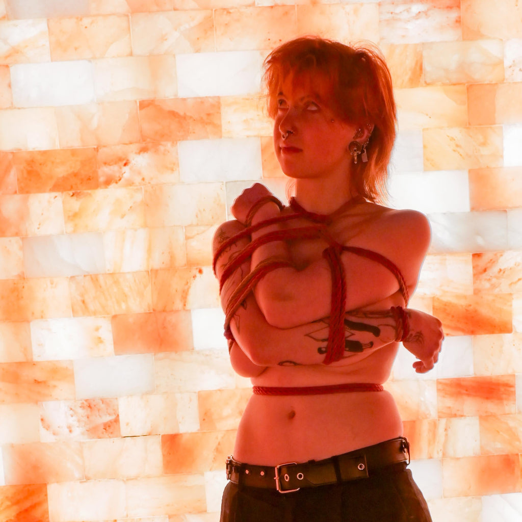 Red head women tied with shibari rope 